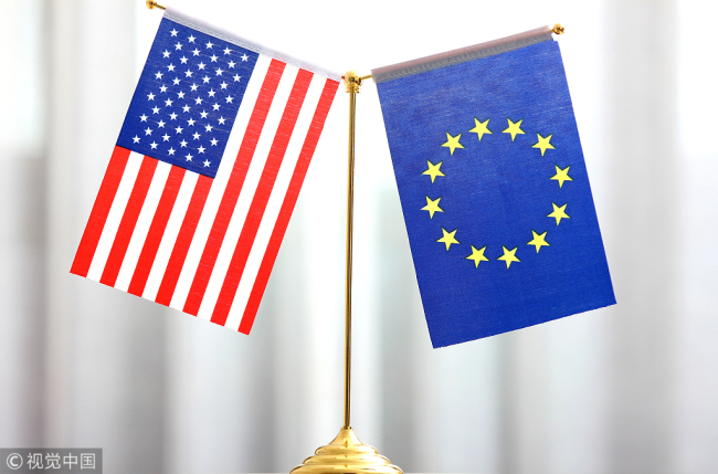 Flags of the United States and the European Union. [File photo: VCG]