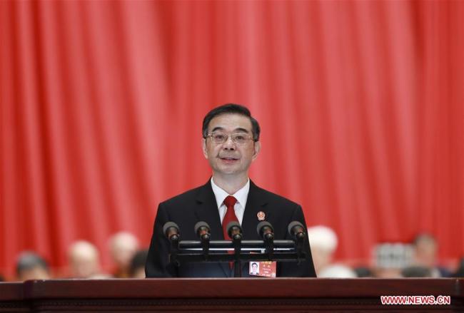 Chief Justice Zhou Qiang delivers a work report of the Supreme People's Court (SPC) at the third plenary meeting of the second session of the 13th National People's Congress (NPC) at the Great Hall of the People in Beijing, March 12, 2019. [Photo: Xinhua/Pang Xinglei]