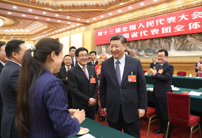 President Xi Jinping attends a panel discussion with his fellow deputies from Gansu Province at the second session of the 13th National People's Congress in Beijing on March 7, 2019. [Photo: Xinhua]