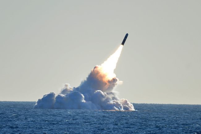 An unarmed Trident II D5 missile launches from the Ohio-class ballistic missile submarine USS Nebraska (SSBN 739) off the coast of California. [File Photo: IC]