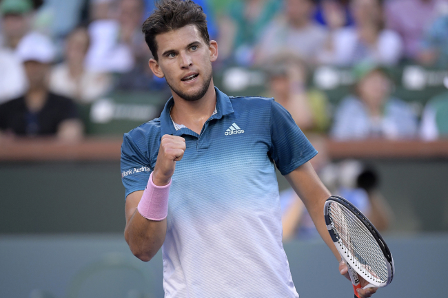 Dominic Thiem, of Austria, celebrates after winning a game against Roger Federer, of Switzerland, during the men's final at the BNP Paribas Open tennis tournament Sunday, March 17, 2019, in Indian Wells, Calif. [Photo: AP]