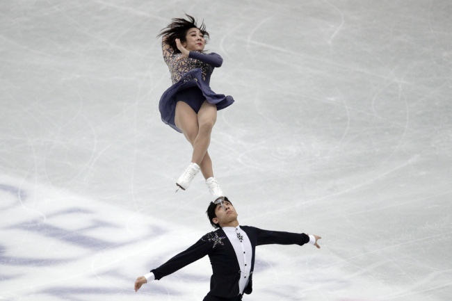 Chinese pair Sui Wenjing and Han Cong compete during the pairs short program in the Japan World Figure Skating Championships at Saitama Super Arena in Saitama, north of Tokyo, Wednesday, March 20, 2019. [Photo: AP]