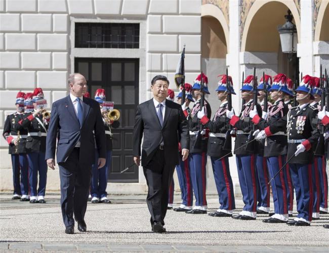 Chinese President Xi Jinping attends a grand welcome ceremony held by Prince Albert II, head of state of the Principality of Monaco, before their talks in Monaco, March 24, 2019. [Photo: Xinhua/Wang Ye]