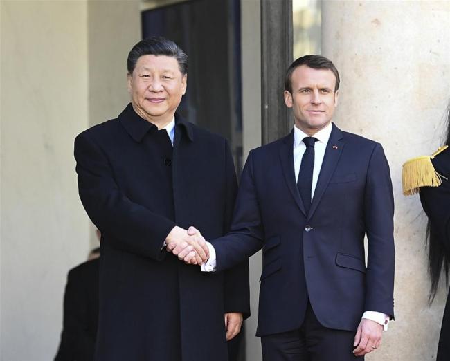Chinese President Xi Jinping (L) holds talks with his French counterpart Emmanuel Macron at the Elysee Palace in Paris, France, March 25, 2019. [Photo: Xinhua/Xie Huanchi]