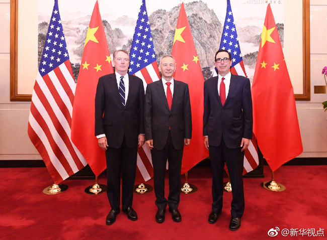 Chinese Vice Premier Liu He (center), also a member of the Political Bureau of the Communist Party of China Central Committee and chief of the Chinese side of the China-U.S. comprehensive economic dialogue, U.S. Trade Representative Robert Lighthizer (left), and Treasury Secretary Steven Mnuchin participate in a new round of high-level economic and trade consultations held in Beijing from March 28 to 29, 2019. [Photo: Xinhua]