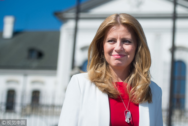 Zuzana Caputova speaks to a journalist in the front of the Presidential palace in Bratislava, Slovakia on March 31, 2019. [Photo: VCG]