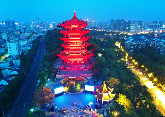 The Yellow Crane Tower is lit up at night to cheer for the inauguration of China-EU Light Bridge activity of 2018 EU-China Tourism Year in Wuhan city, central China's Hubei province, May 9, 2018. [Photo: IC]