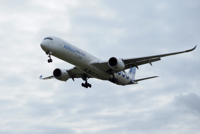 In this file photo taken on February 8, 2019 an Airbus A350-1000 conducts a test flight over Chateauroux airport, central France. [File Photo: AFP]