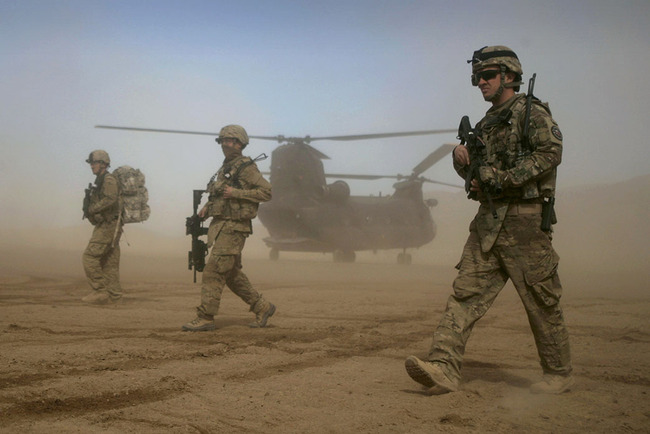 In this Saturday, Jan. 28, 2012 file photo, U.S. soldiers, part of the NATO- led International Security Assistance Force (ISAF) walk west of Kabul, Afghanistan. NATO Secretary-General Jens Stoltenberg is playing down differences among member countries as the military alliance marks its 70th anniversary in Washington on April 4, 2019. [File photo: AP]