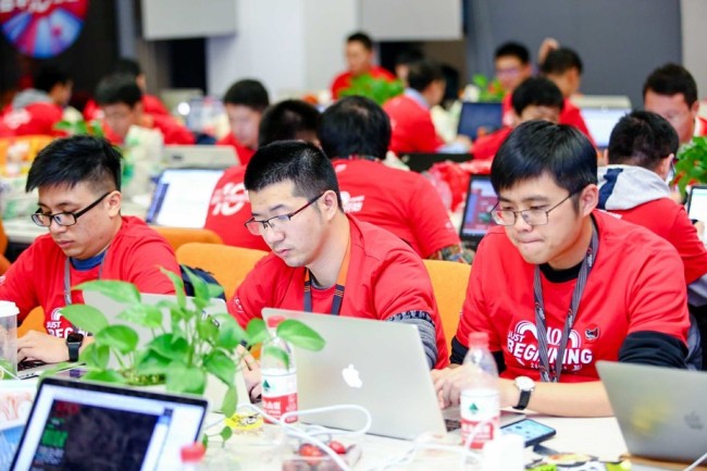 Programmers work in a Chinese tech firm. [Photo: IC]