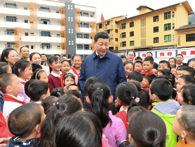 Chinese President Xi Jinping, also general secretary of the Communist Party of China Central Committee and chairman of the Central Military Commission, visits a primary school in Shizhu Tujia Autonomous County, Chongqing on April 15, 2019. [Photo: Xinhua]<br><br>Chinese President Xi Jinping, also general secretary of the Communist Party of China Central Committee and chairman of the Central Military Commission, visits house of Tan Dengzhou, an impoverished villager, during his inspection tour in Shizhu Tujia Autonomous County, Chongqing on April 15, 2019. [Photo: Xinhua]