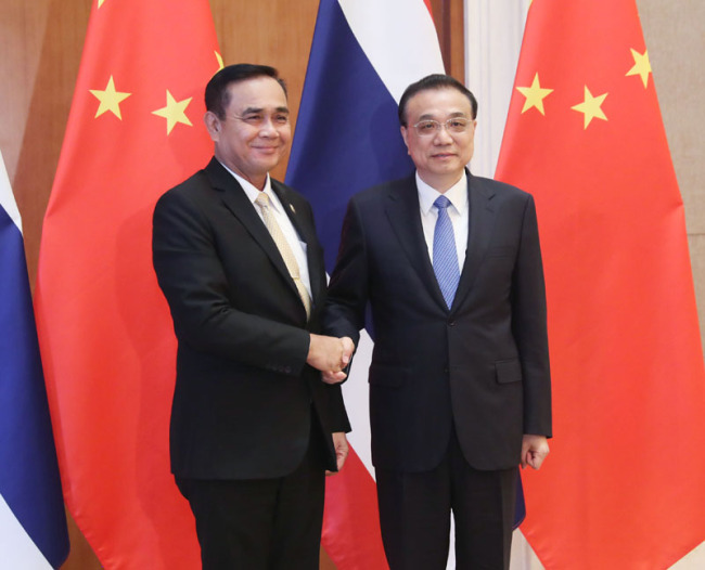 Chinese Premier Li Keqiang meets with Thai Prime Minister Prayut Chan-o-cha in Beijing on Friday, April 26, 2019. [Photo: Gov.cn]
