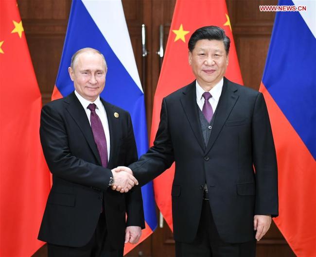 Chinese President Xi Jinping (R) holds talks with his Russian counterpart Vladimir Putin on the sidelines of the Second Belt and Road Forum for International Cooperation in Beijing, capital of China, April 26, 2019. [Photo: Xinhua/Xie Huanchi]
