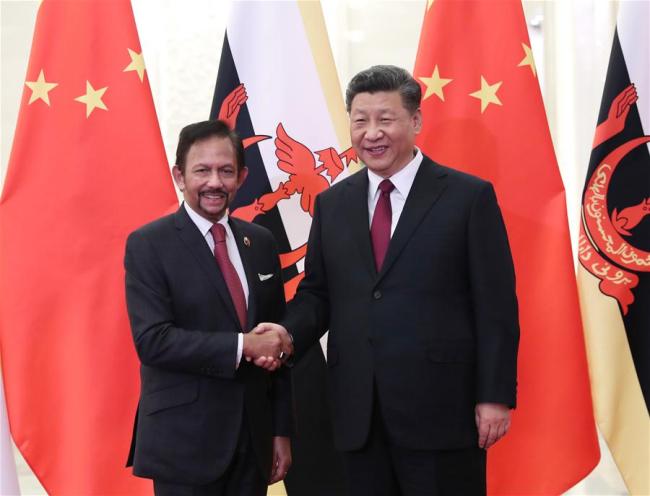 Chinese President Xi Jinping (R) meets with Brunei's Sultan Haji Hassanal Bolkiah, who is attending the Second Belt and Road Forum for International Cooperation, in Beijing, capital of China, April 26, 2019. [Photo: Xinhua]