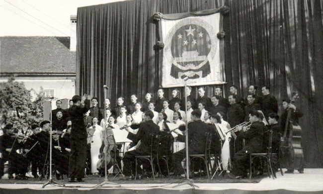 In 1951-1952, Li Huanzhi as a conductor in a Chinese orchestra during its performing tour in east Europe.  [Photo Courtesy of Li Dakang]