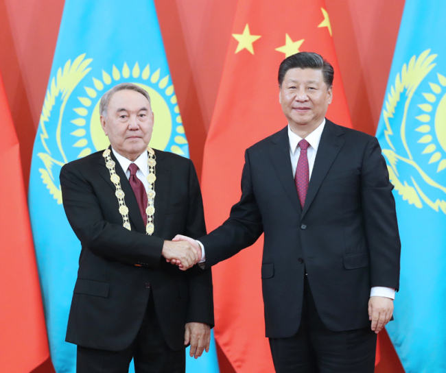 Chinese President Xi Jinping holds a ceremony to award the first president of Kazakhstan Nursultan Nazarbayev the Friendship Medal of the People's Republic of China at the Great Hall of the People in Beijing on April 28, 2019. [Photo: Xinhua]
