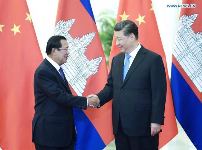 Chinese President Xi Jinping (R) meets with Cambodian Prime Minister Samdech Techo Hun Sen at the Great Hall of the People in Beijing, capital of China, April 29, 2019. [Photo: Xinhua/Li Xueren]