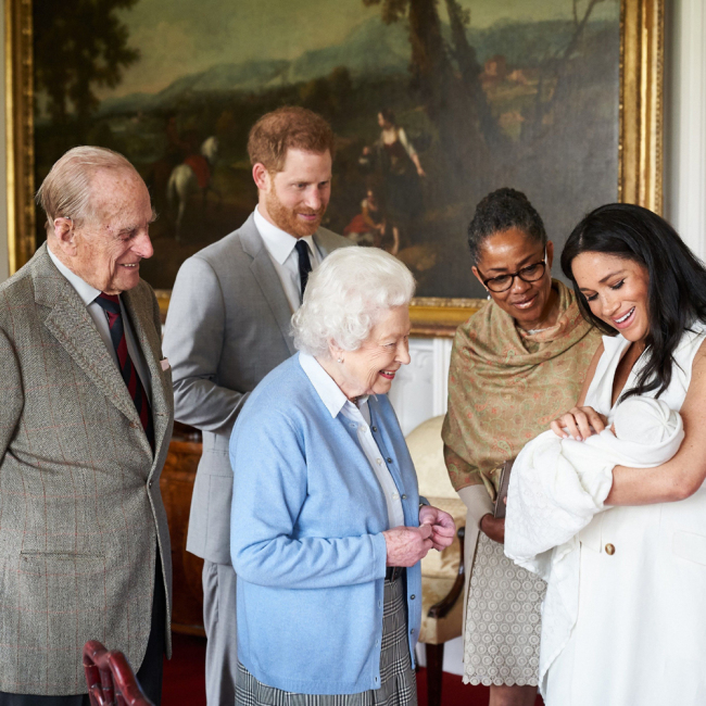 A handout photograph released by The Duke and Duchess of Sussex on May 8, 2019 shows Britain's Prince Harry, Duke of Sussex (L), and his wife Meghan, Duchess of Sussex (R), accompanied by Meghan's mother Doria Ragland, showing their newborn baby son, Archie Harrison Mountbatten-Windsor to Britain's Queen Elizabeth II (C) and Britain's Prince Philip, Duke of Edinburgh (L), at Windsor Castle in Windsor, west of London on May 8, 2019. [Photo: AFP]