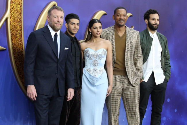 Guy Ritchie, Mena Massoud, Will Smith, Naomi Scott and Marwan Kenzari arrive at the UK premiere of Aladdin in London's Leicester Square on May 9, 2019. [Photo: IC]