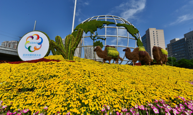 A view of the Conference on Dialogue of Asian Civilizations themed flower garden is showed in downtown Beijing on May 3, 2019. [Photo: IC]<br/>