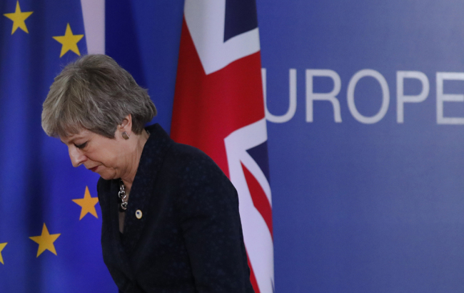 British Prime Minister Theresa May leaves after addressing a media conference at an EU summit in Brussels, Friday, March 22, 2019. [File Photo: AP]