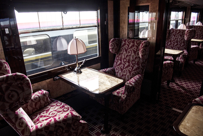 The picture taken on May 13, 2019 shows the interior of a newly-restored carriage of an Orient Express train displayed at the Gare de l'Est train station in Paris. [Photo: AFP/Christophe Archambault]