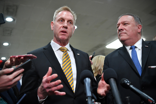 United States Secretary of Defense Patrick Shanahan (L) and US Secretary of state Mike Pompeo give a statement after a closed-door briefing on Iran in the auditorium of the Capitol Visitors Center in Washington, DC on May 21, 2019. [Photo: AFP/Mandel Ngan]