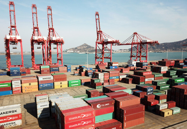 Stacks of containers to be shipped abroad are seen at the Port of Lianyungang, Jiangsu Province, December 8, 2018. [File photo: IC]