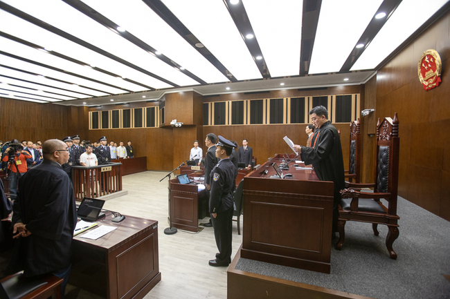 Huang Yichuan stands trial at the Shanghai No. 1 Intermediate People's Court on May 23, 2019. [Photo: China Daily]