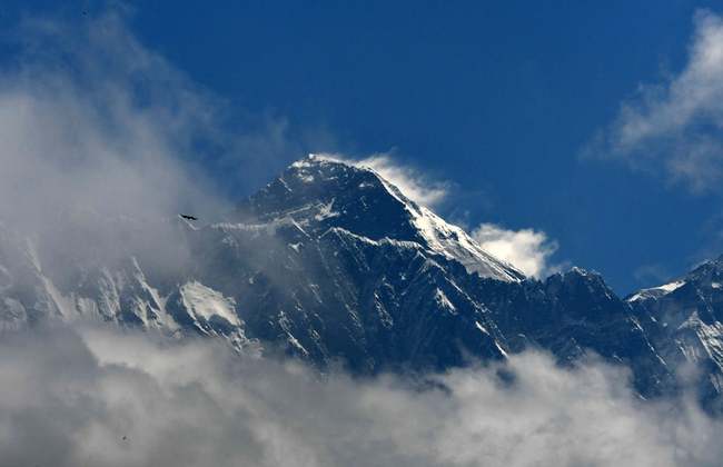 Mt. Qomolangma (height 8848 metres) is seen in the Qomolangma region, some 140 km northeast of Kathmandu, May 27, 2019. [File Photo: AFP]