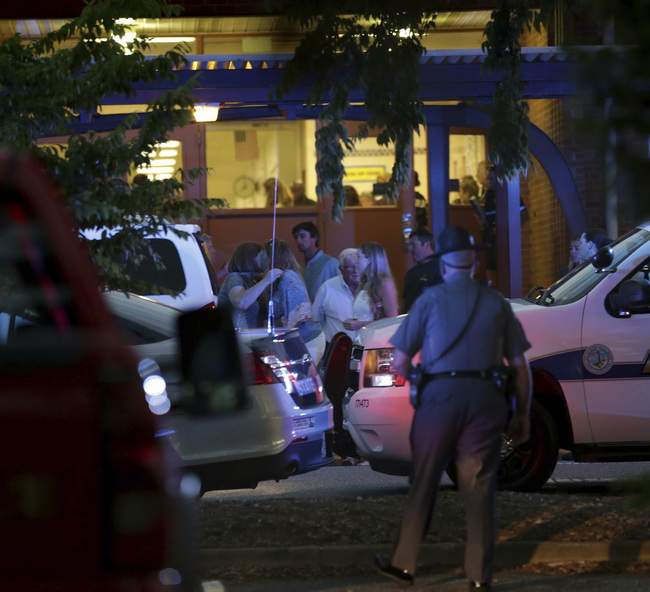 Family members gather outside the Princess Anne Middle School in Virginia Beach, Va, on Friday, May 31, 2019. [Photo: IC]