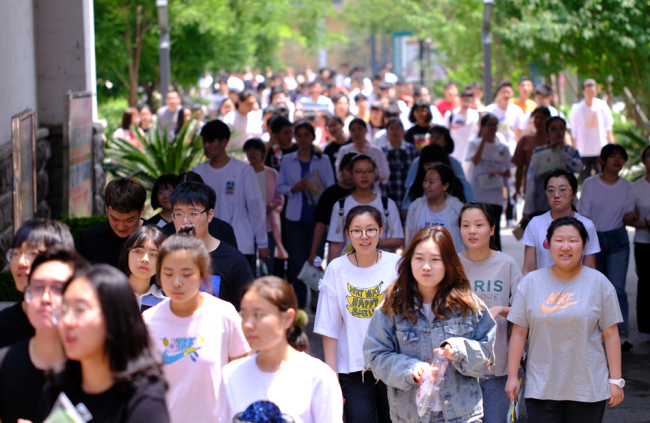 Students walk out of the examination room in Shenyang, Liaoning Province on June 7, 2019. [Photo: IC]