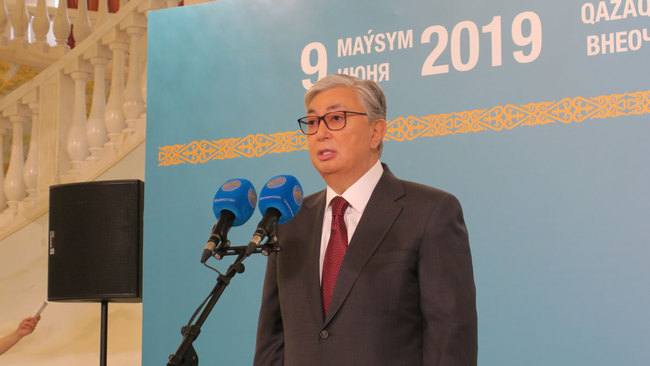 Presidential candidate Kassym-Jomart Tokayev speaks after casting his ballot during the presidential elections in Nur-Sultan, Kazakhstan, 09 June 2019. [Photo: IC]