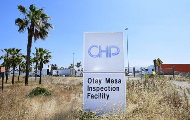 Trucks wait in line to exit the inspection facility and enter the United States at the Otay Mesa port of entry at the US-Mexico border in San Diego, California on June 8, 2019. US President Donald Trump touted on Saturday his last-minute deal averting tariffs on Mexico, a plan economists warned would have been disastrous for both countries, saying the agreement will be a big success if America's southern neighbor cracks down on illegal immigration as promised. [Photo: AFP]