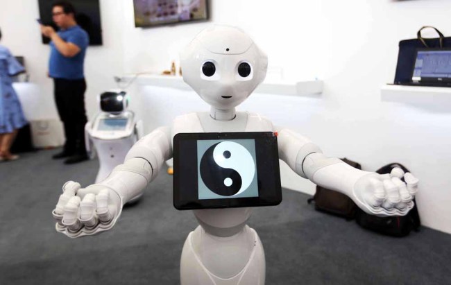 A robot performs Taichi before the 2018 World Artificial Intelligence Conference in Shanghai on September 14, 2018. [File photo: IC]