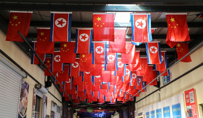 National flags of China and DPRK [File photo: IC]