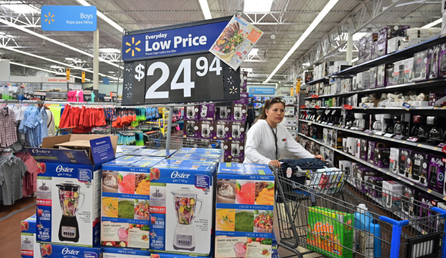 A woman shops at a Walmart Supercenter store in Rosemead, California on May 23, 2019. [Photo: AFP]