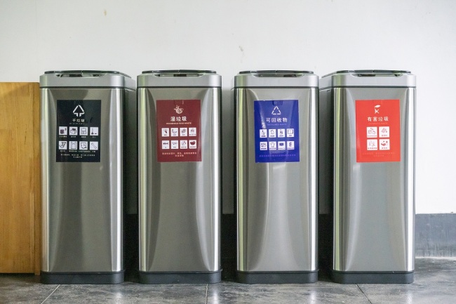 Photos of garbage cans classified for sorting in Shanghai, June 20, 2019. [File photo: VCG]