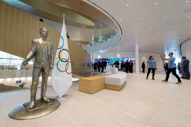 A statue of the Baron Pierre de Coubertin is placed at the entrance of the Olympic house, the new International Olympic Committee (IOC) headquarters, after the inauguration ceremony in Lausanne, on June 23, 2019 ahead of the decision on 2026 Winter Games host. [Photo: FABRICE COFFRINI / POOL / AFP]