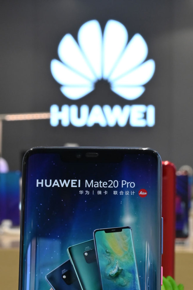 A Huawei smartphone is seen in a Huawei store in Shanghai on May 24, 2019. [File photo: AFP/Hector Retamal]
