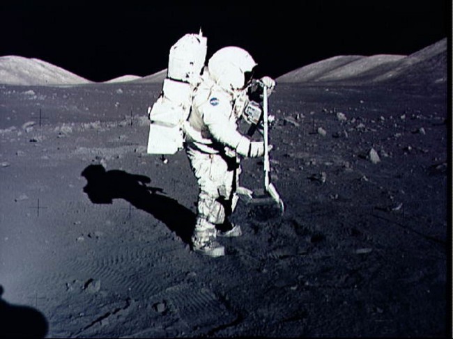 In this December 10, 1972, image obtained from NASA, astronaut Harrison Schmitt collects lunar rock samples at the Taurus-Littrow landing site on the moon during the Apollo 17 mission. [Photo: AFP]