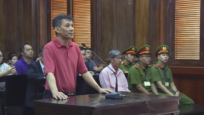 Michael Nguyen stands during his trial, Monday, June 24, 2019, in Ho Chin Minh City, Vietnam. [Photo: AP]