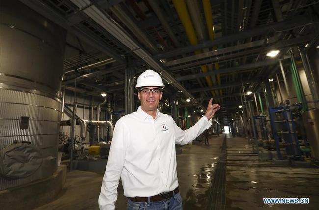 Nick Bowdish, president and CEO of Elite Octane, LLC., introduces his ethanol plant in Atlantic, Iowa, the United States, June 18, 2019. [Photo: Xinhua]