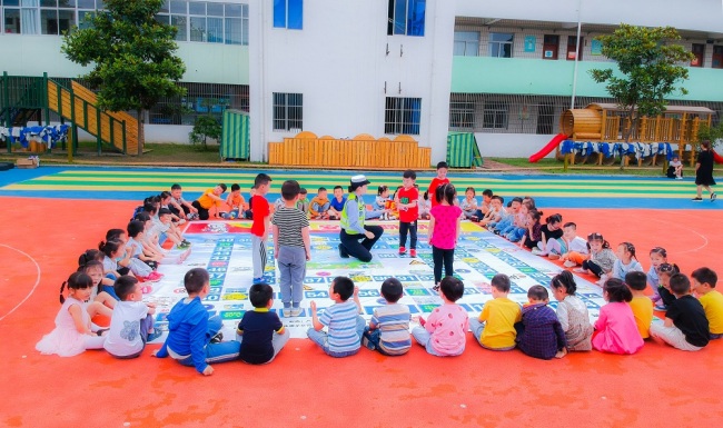 Children gathered together at the playground in a kindergarten. [File photo: IC]