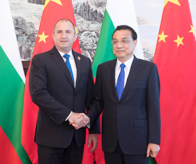 Premier Li Keqiang meets with Bulgarian President Rumen Radev on the sidelines of the World Economic Forum in Dalian, northeast China's Liaoning provinceon Monday, July 1, 2019.[Photo: gov.cn]