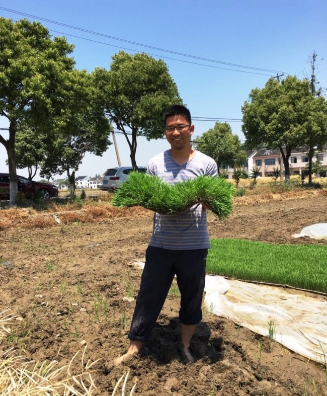 Twenty-nine year old Zhu Yunde is dubbed a new type of career farmer as he and his market-oriented rice farm aims to transform rice agriculture in China. [Photo: Chinaplus/Yin Xiuqi]
