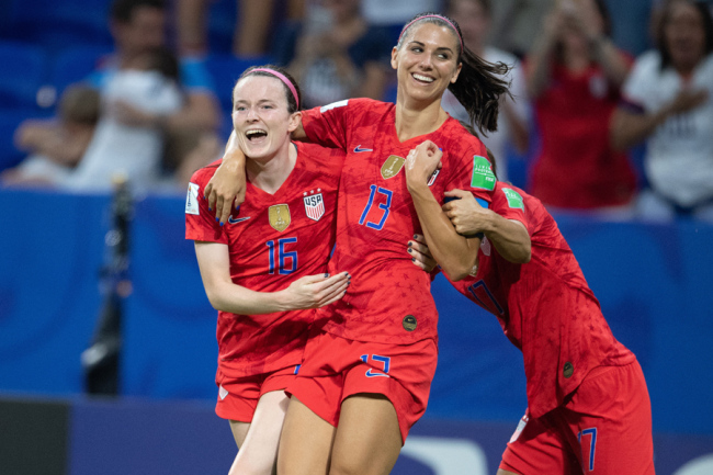 Alex Morgan of USA celebrates with teammates scoring a goal during the 2019 FIFA Women's World Cup France Semi Final match between England and USA at Groupama Stadium on July 2, 2019 in Decines near Lyon, France. [Photo: IC]