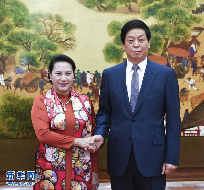 Top Chinese legislator Li Zhanshu meets with visiting Chairwoman of the National Assembly of Vietnam Nguyen Thi Kim Ngan in Beijing on July 12, 2019. [Photo: Xinhua]