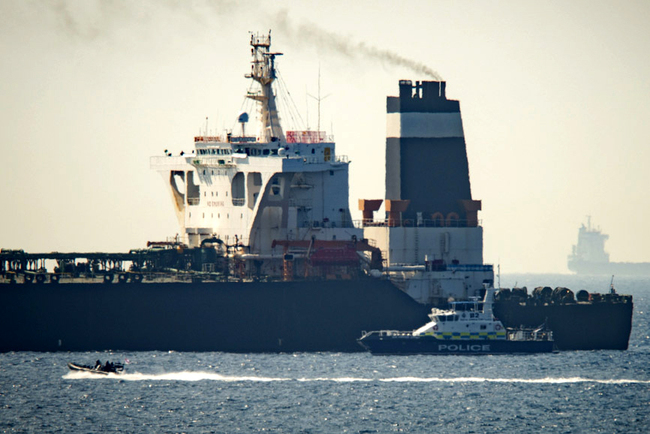 Royal Marine patrol vessel is seen beside the Grace 1 oil supertanker in the British territory of Gibraltar, July 4, 2019. [Photo: IC]