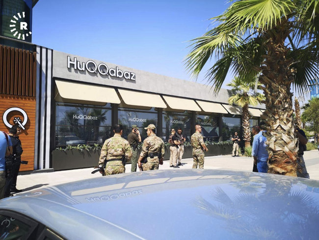 Security forces gather at the scene of a shooting outside a restaurant in Irbil, Iraq, Wednesday, July 17, 2019. [Photo: AP]